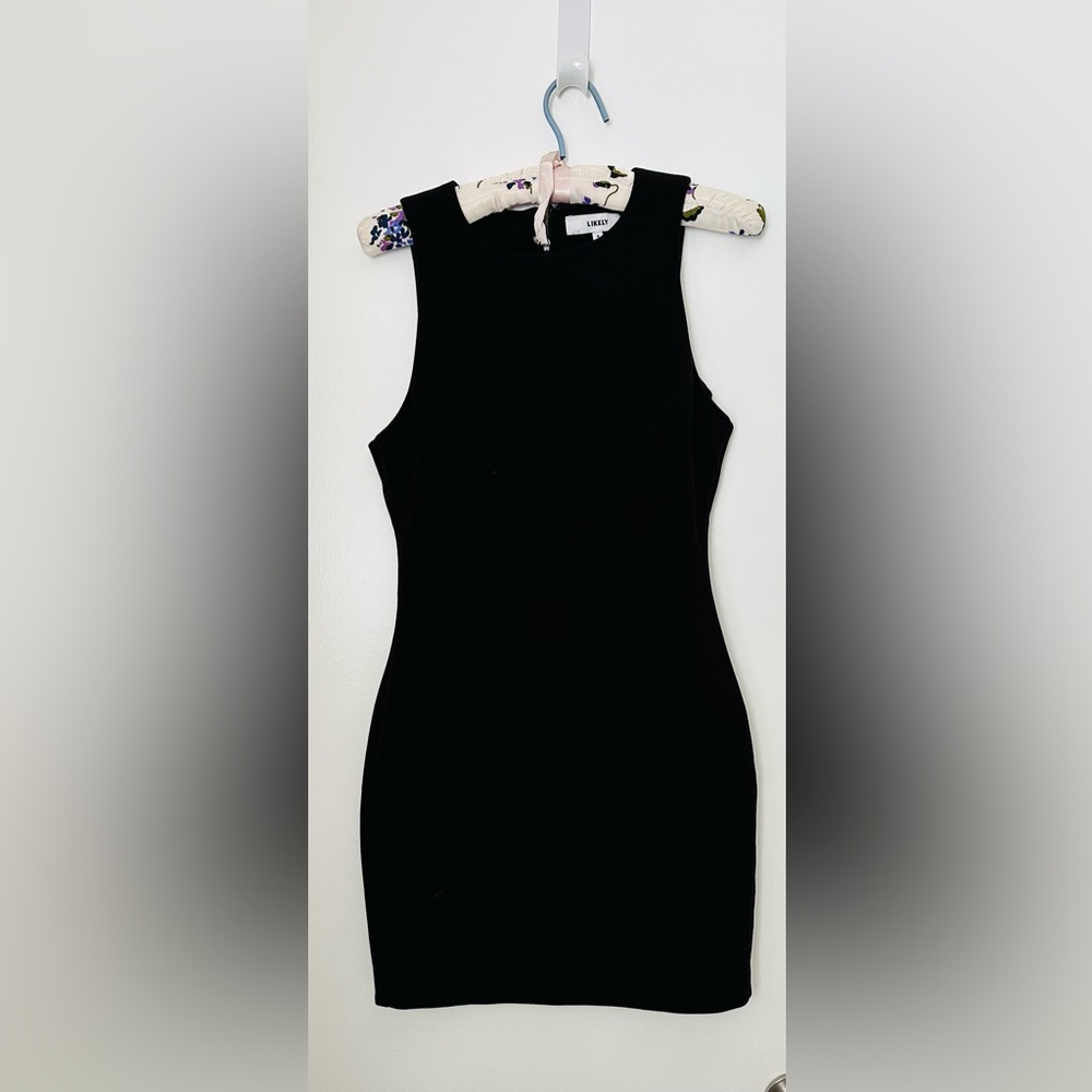 Size 4 Likely Dress. Sleeveless Manhattan Dress. Crew neck cut. Great condition!